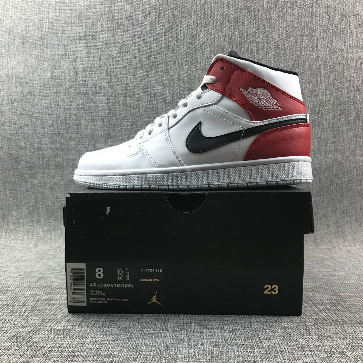 Air Jordan 1 Mid Sneakers in White Red 554724-116 - product image from the listing.