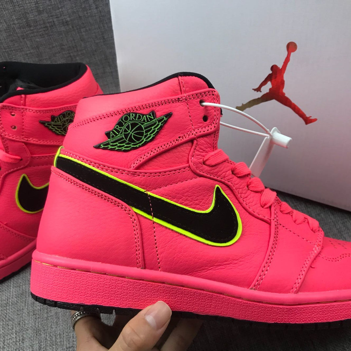 Air Jordan 1 Mid Sneakers in Pink Black Volt AQ9131-600 - product image from the listing.