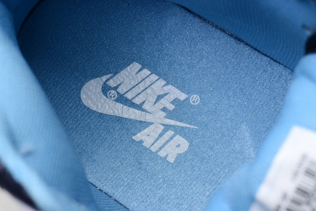 Blue and White Jordan 1 High Paul Edition Navy Sneakers - product image from the listing.
