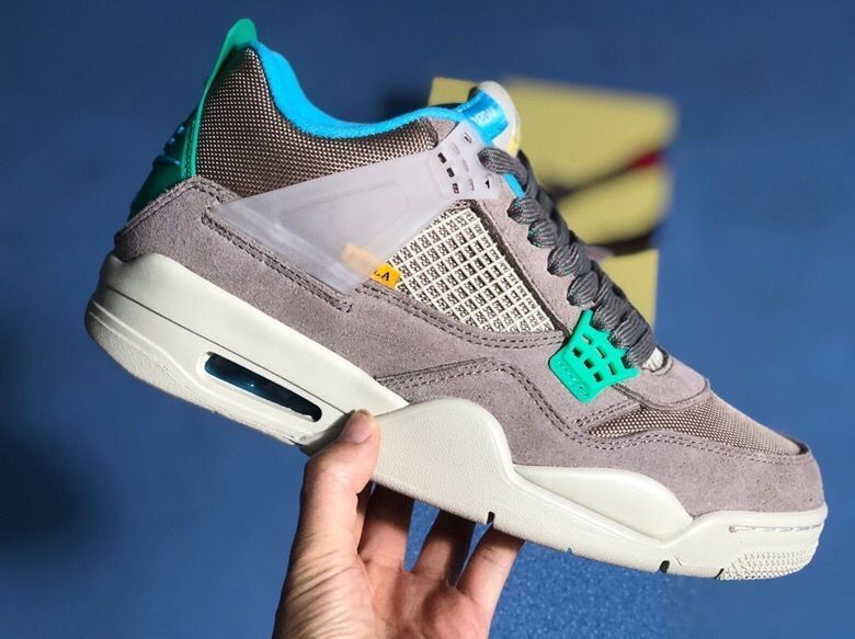 Air Jordan 4 Retro Gray Teal Sneakers - product image from the listing.