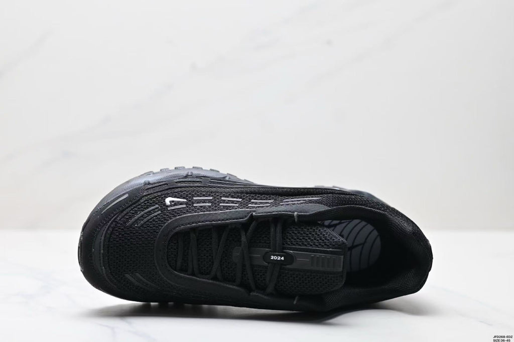 Nike Air Max Plus x Comme des Garçons Sneakers in Black - product image from the listing.