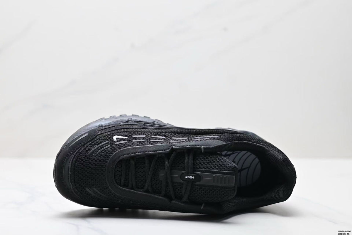 Nike Air Max Plus x Comme des Garçons Sneakers in Black - product image from the listing.