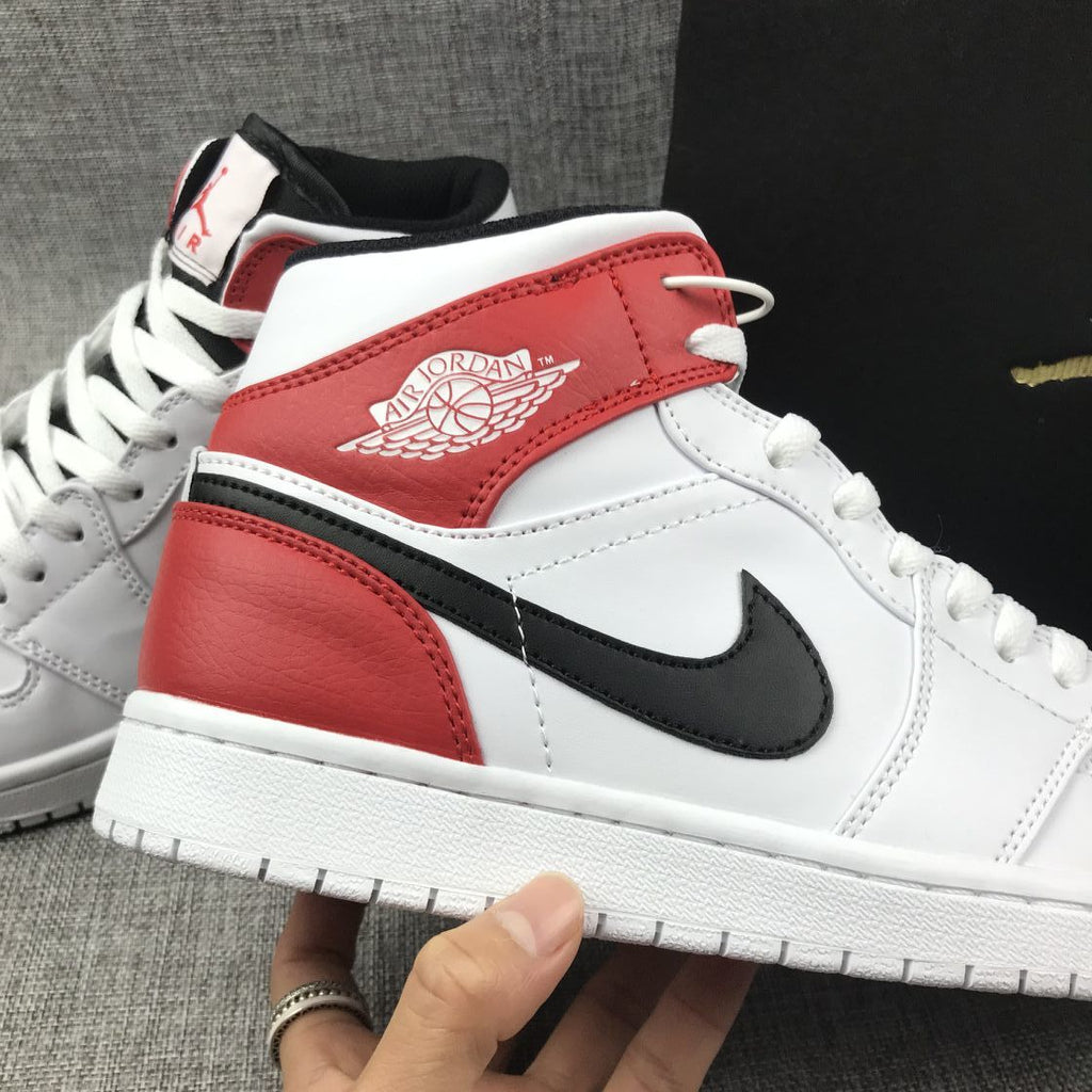 Air Jordan 1 Mid Sneakers in White Red 554724-116 - product image from the listing.