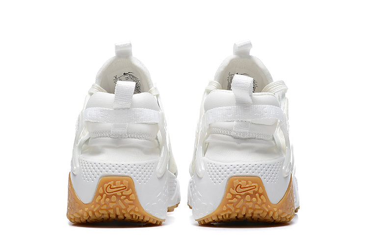 Nike Air Huarache Sneakers in White Gum - product image from the listing.