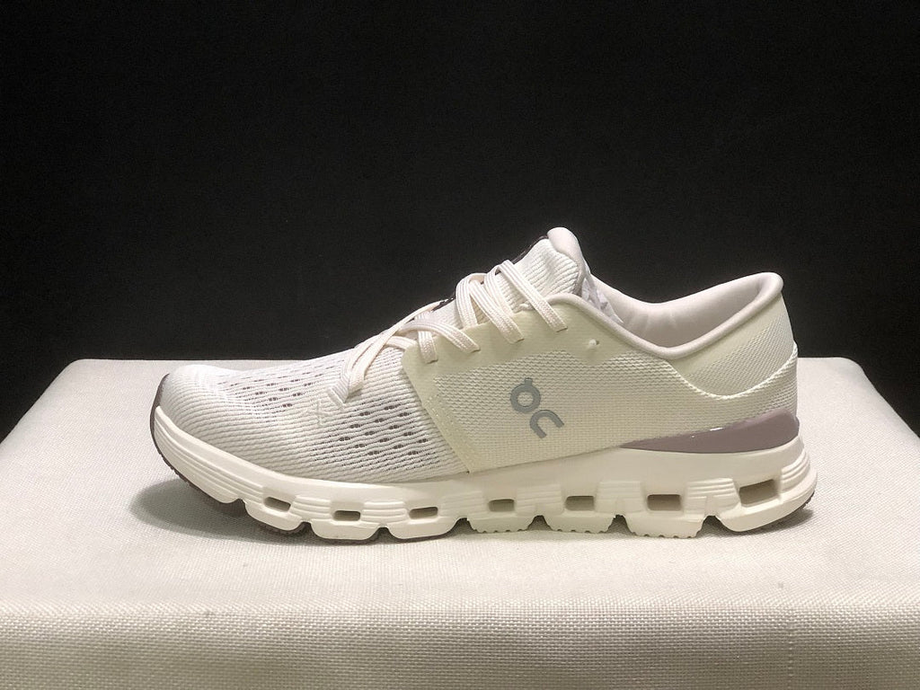 On Cloud X 4 Running Sneakers in Ivory - product image from the listing.