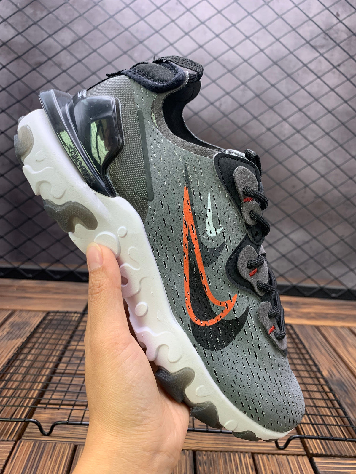 Nike React Sneakers, in Charcoal Gray and Orange - product image from the listing.