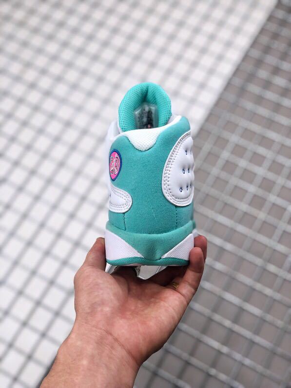 Air Jordan 13 GS Aurora Green Sneakers 439358-100 - product image from the listing.