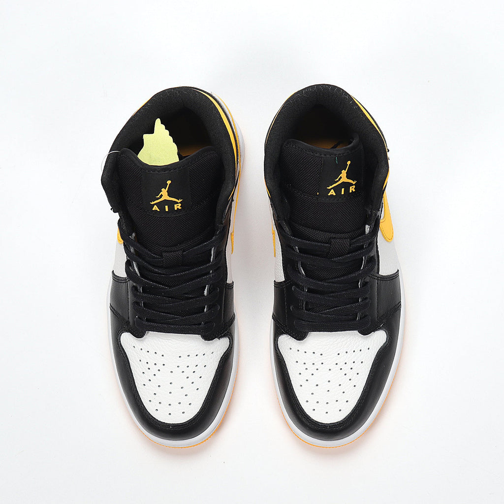 Jordan 1 High Sneakers in Black Yellow White CV5276-107 - product image from the listing.