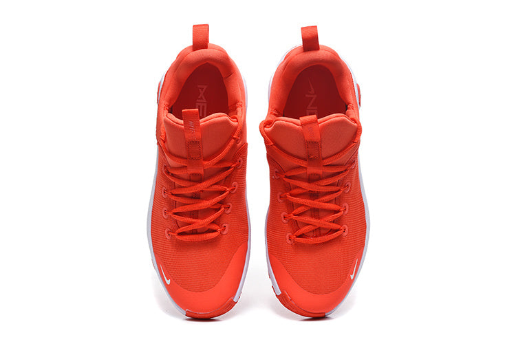 Nike Free Metcon 5 Sneakers in Red and White - product image from the listing.