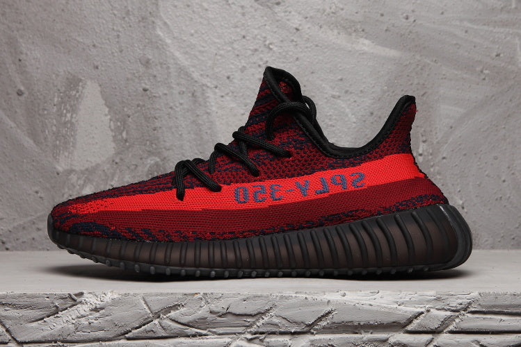 Red and Black Yeezy 350 V2 Knit Sneakers - product image from the listing.
