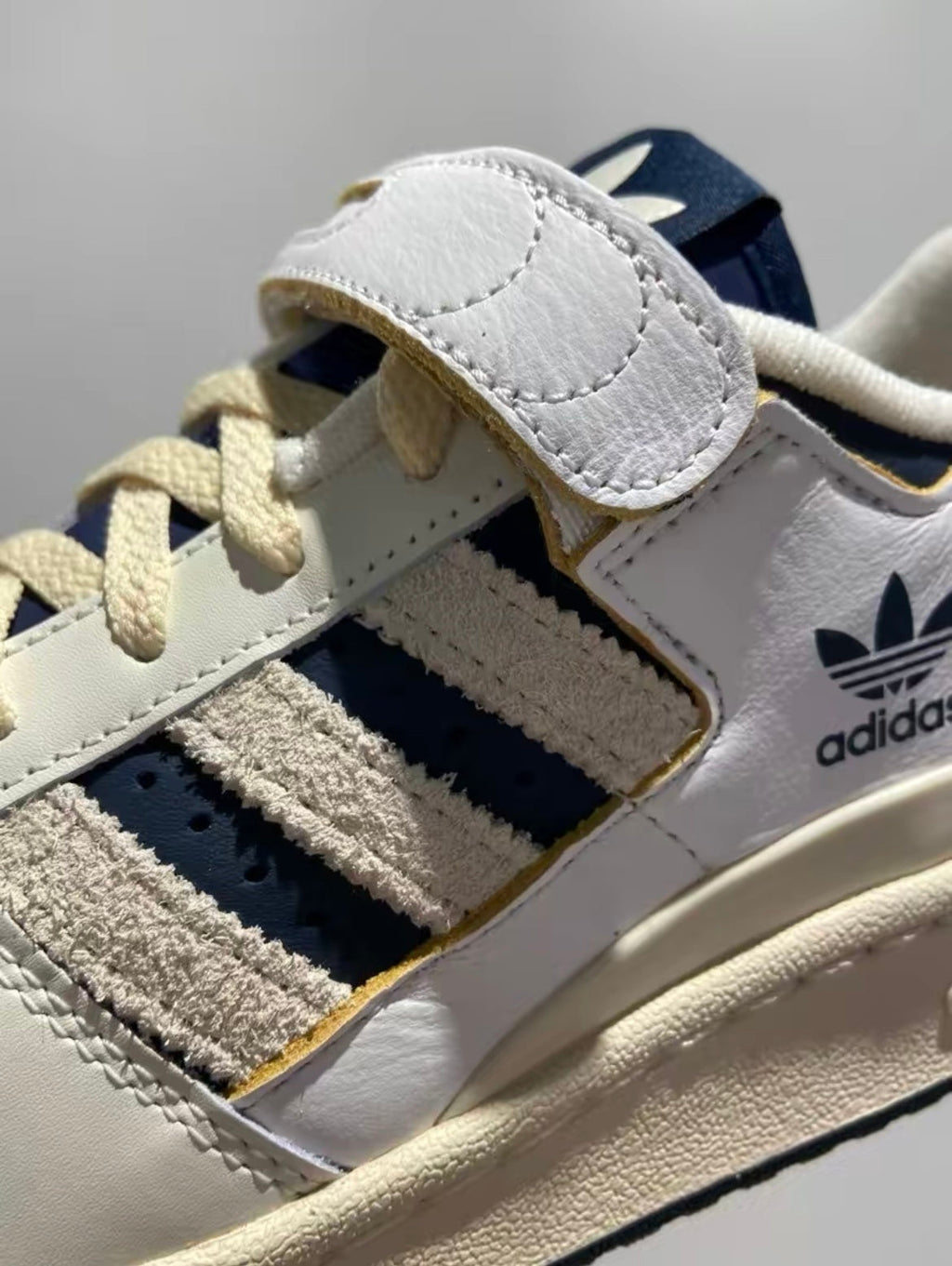 adidas Originals Forum 84 Low Sneakers in White Navy GZ6427 - product image from the listing.