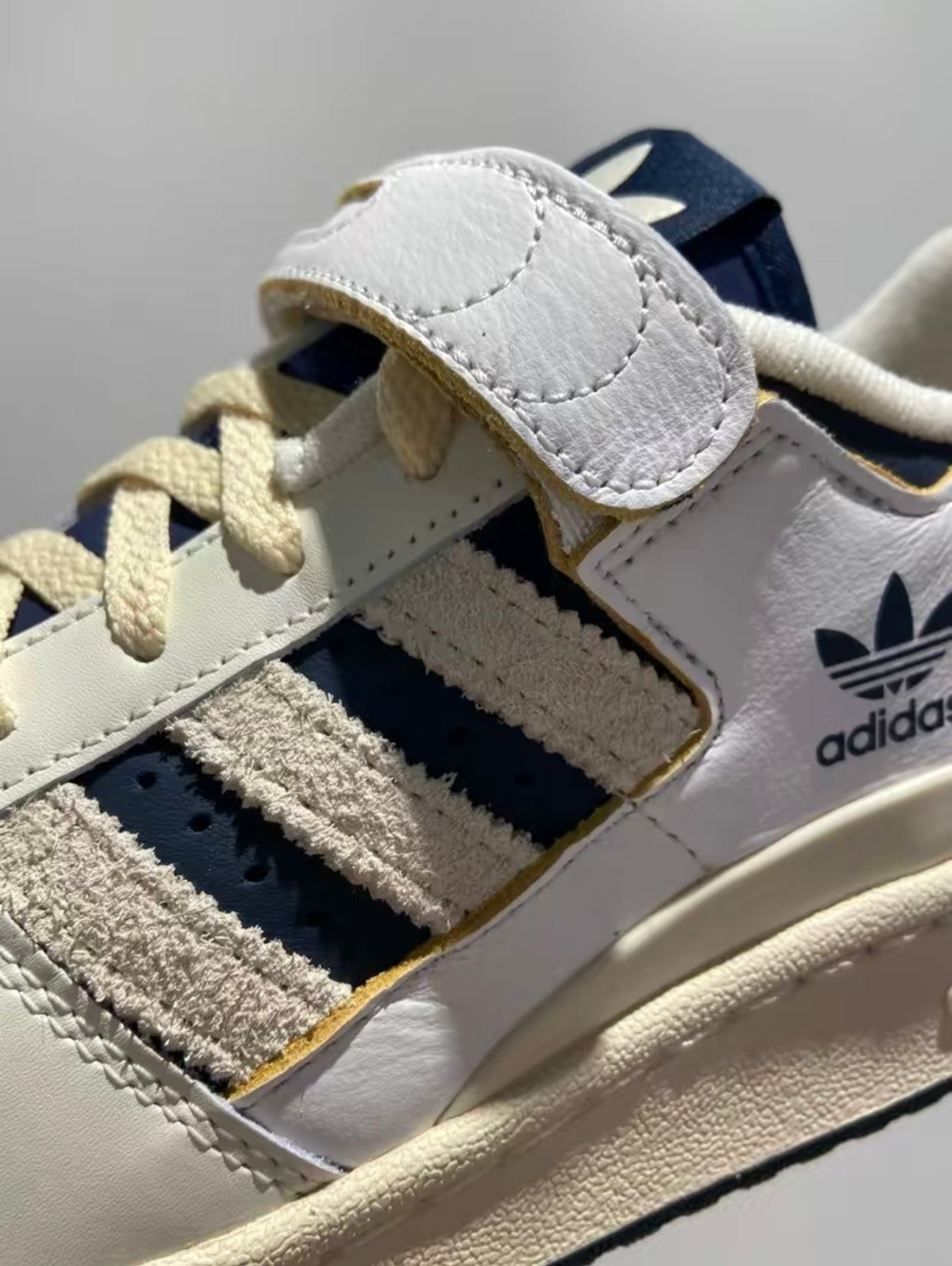adidas Originals Forum 84 Low Sneakers in White Navy GZ6427 - product image from the listing.