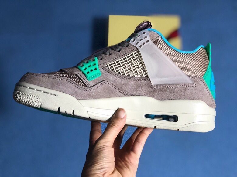 Air Jordan 4 Retro Gray Teal Sneakers - product image from the listing.