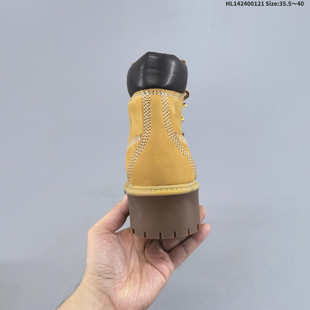 Mid-Top Lace-Up Boots in Wheat by Timberland - product image from the listing.