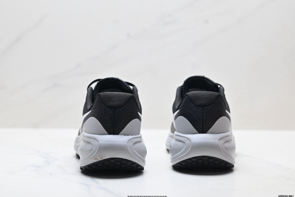 Nike Revolution 8 Running Shoes in Black - product image from the listing.