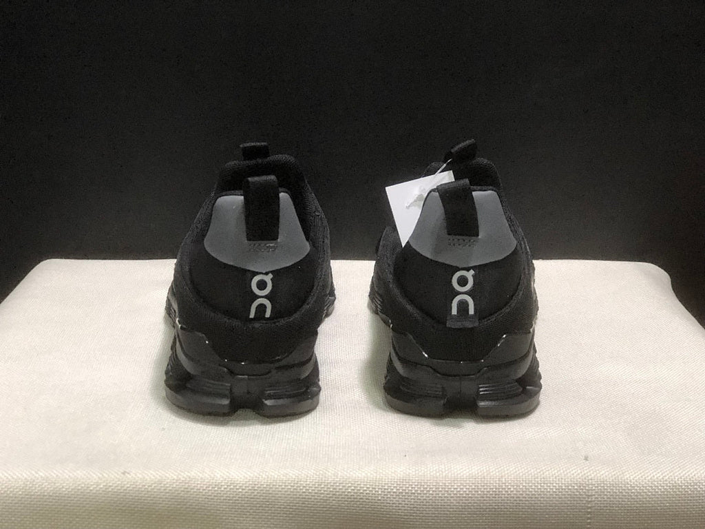 On Cloud 4 Coast Black Slip-On Trainers - product image from the listing.