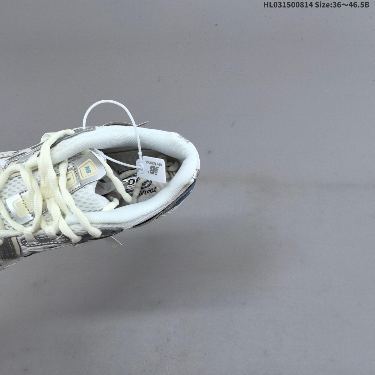 New Balance M1906R Sneakers in White, in Silver and Blue - product image from the listing.