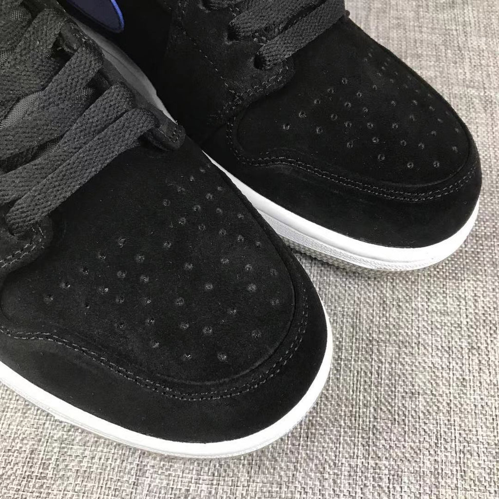 Jordan 1 Mid Sneakers in Black Red Blue 554724-065 - product image from the listing.