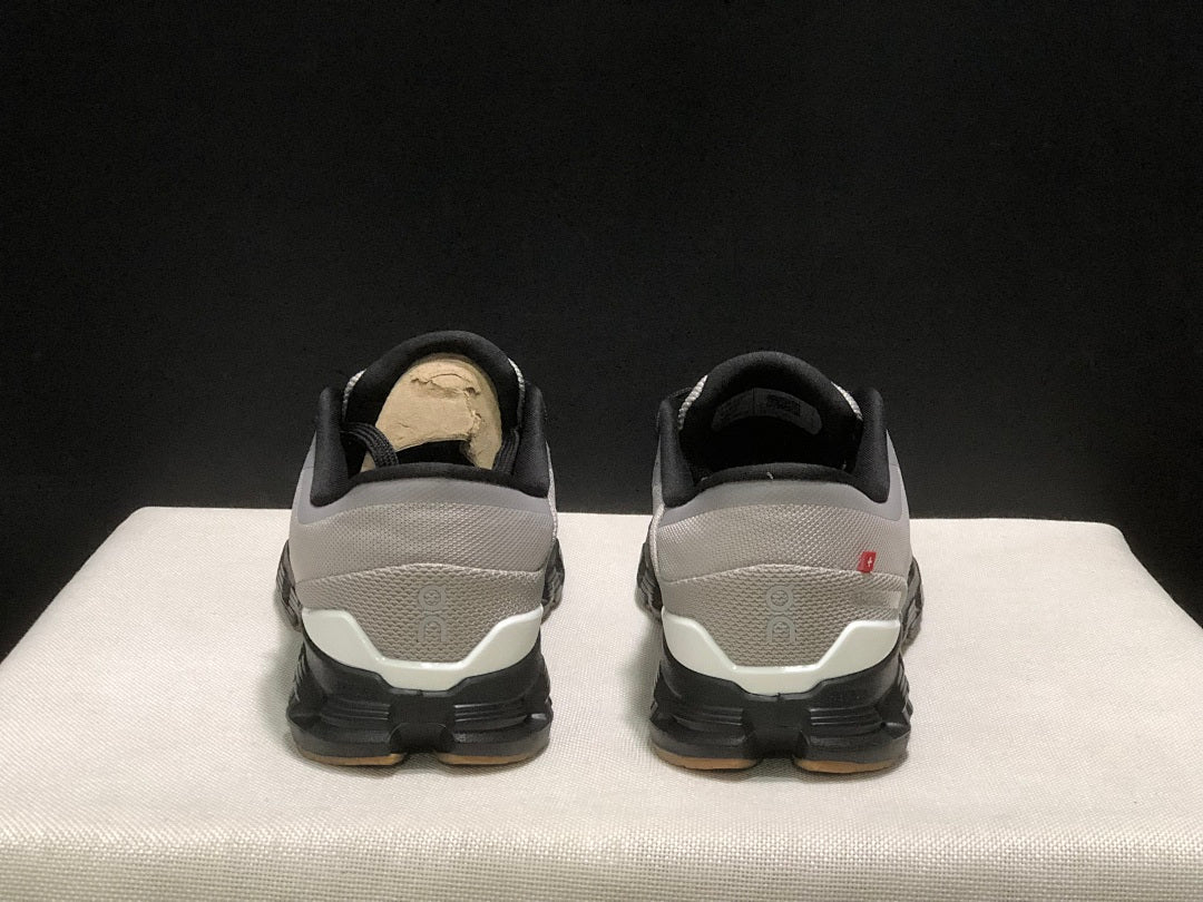 On Cloud X 4 Sneakers in Fog and in Black - product image from the listing.