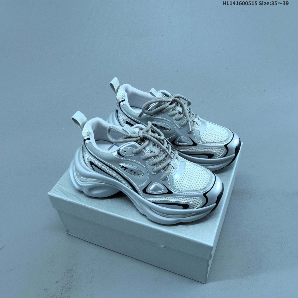 GG-CC G23X4317B Chunky Platform Sneakers, in Silver and White - product image from the listing.