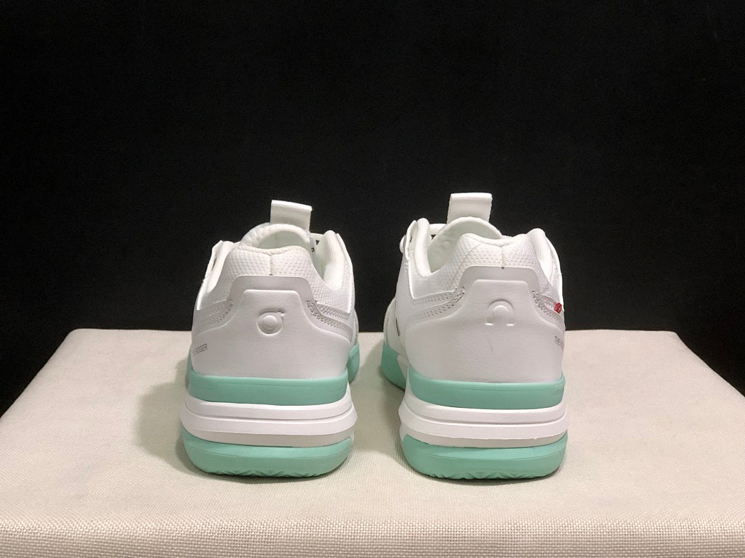 On THE ROGER Clubhouse Pro Tennis Shoes in White Mint Green - product image from the listing.