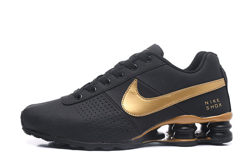 Nike Shox Deliver Trainers in Multiple Colorways - product image from the listing.