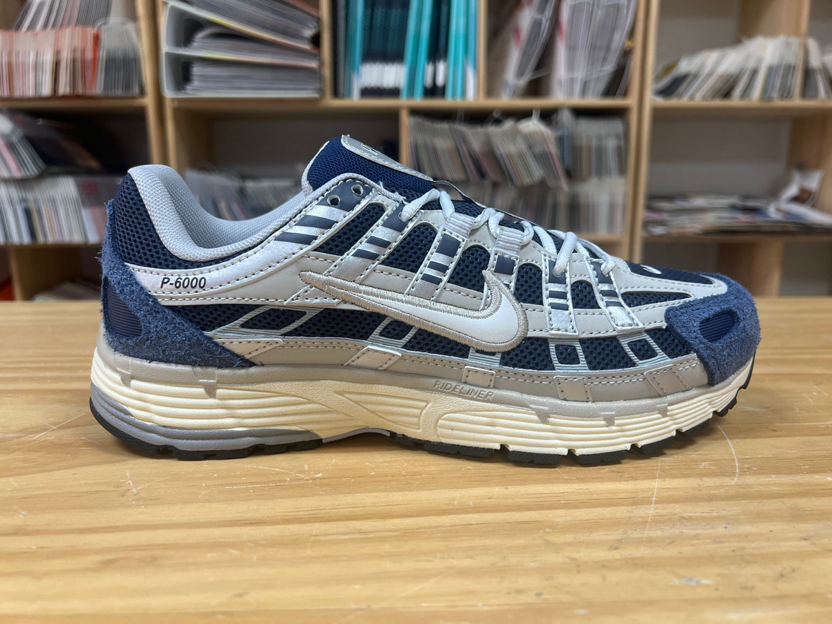 Nike P-6000 Sneakers in Navy and Light Gray IU7549-400 - product image from the listing.