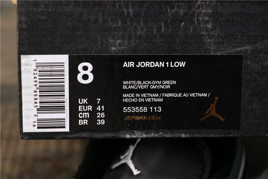 Air Jordan 1 Low Sneakers in Black Green White 553558-113 - product image from the listing.