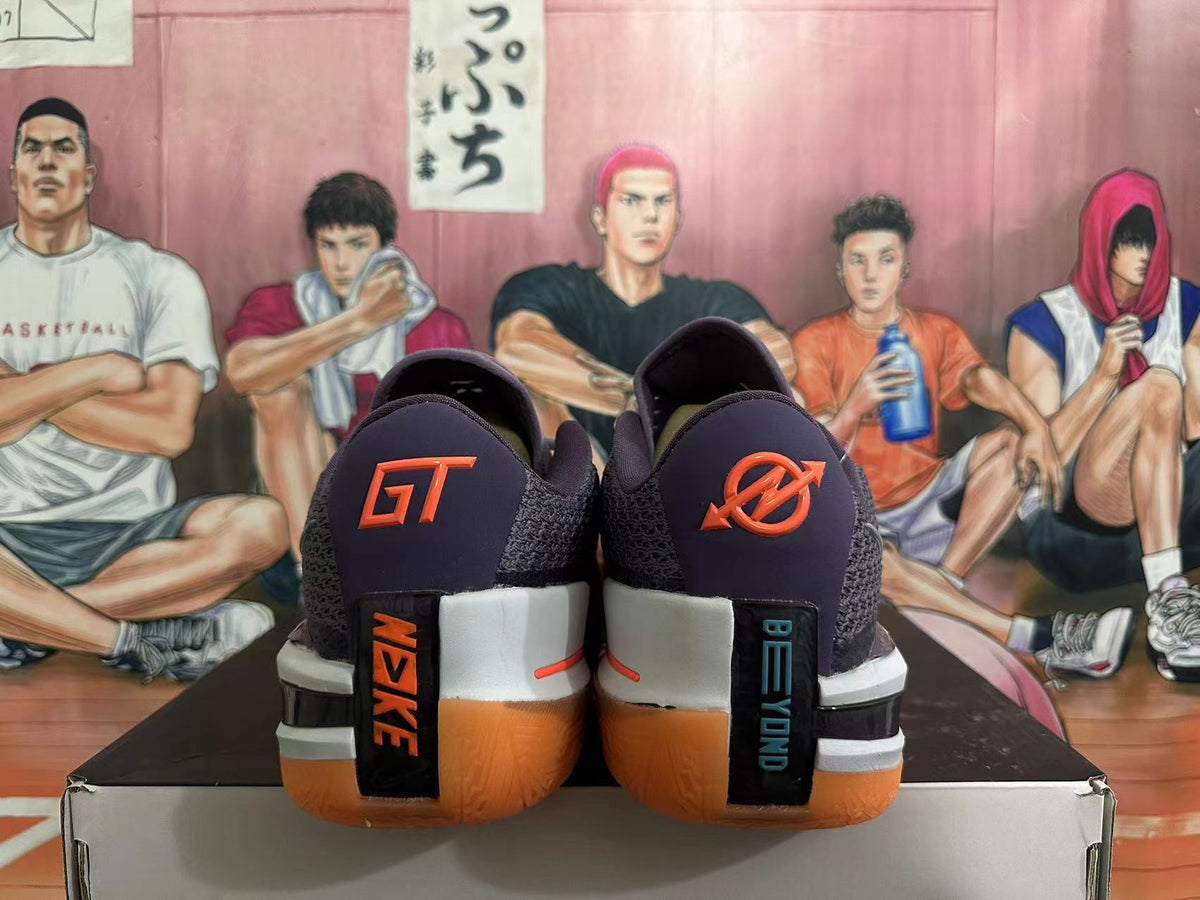 Purple and Orange Nike GT Cut 3 Basketball Shoes - product image from the listing.