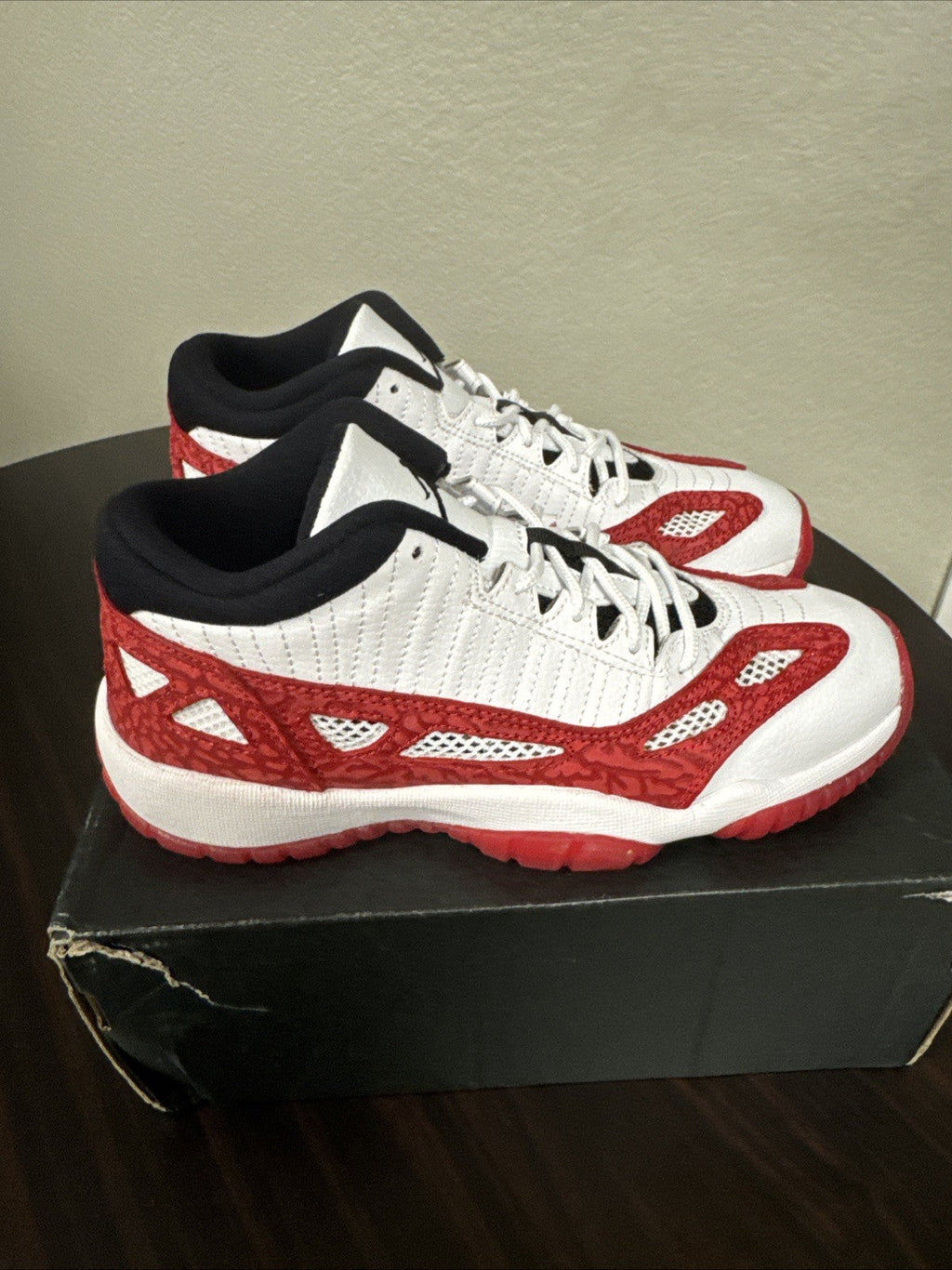 Air Jordan 11 Retro Low Boys White/gym Red Boys / Girls - Size 5Y - product image from the listing.