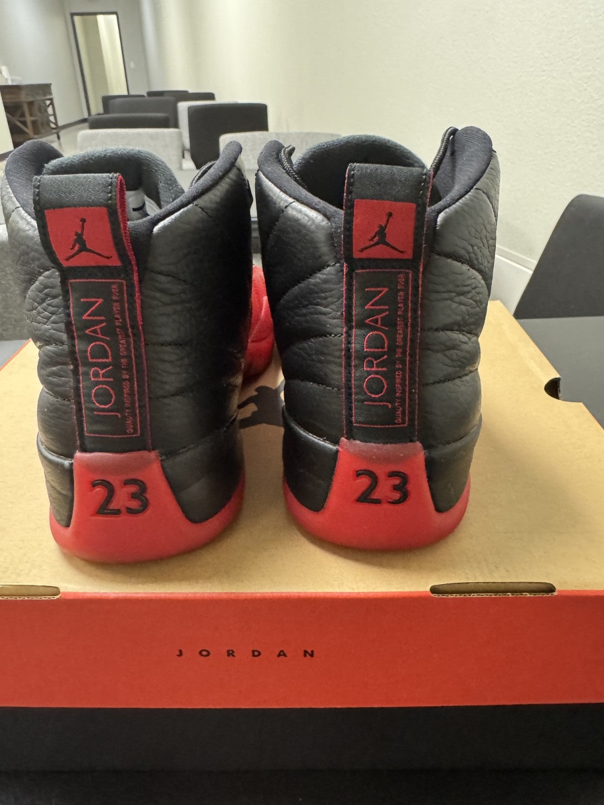 Air Jordan 12 Flu Game Black Red High Top Men's Basketball Sneakers - product image from the listing.