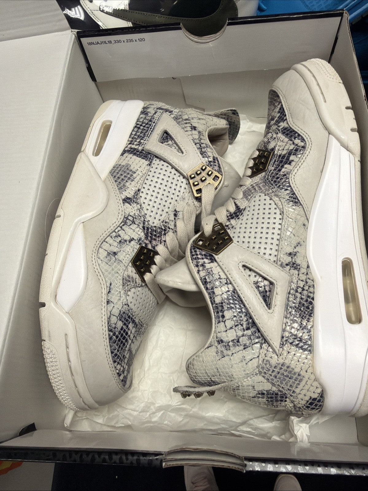 Air Jordan 4 Retro Premium Snakeskin - Size 9 - product image from the listing.