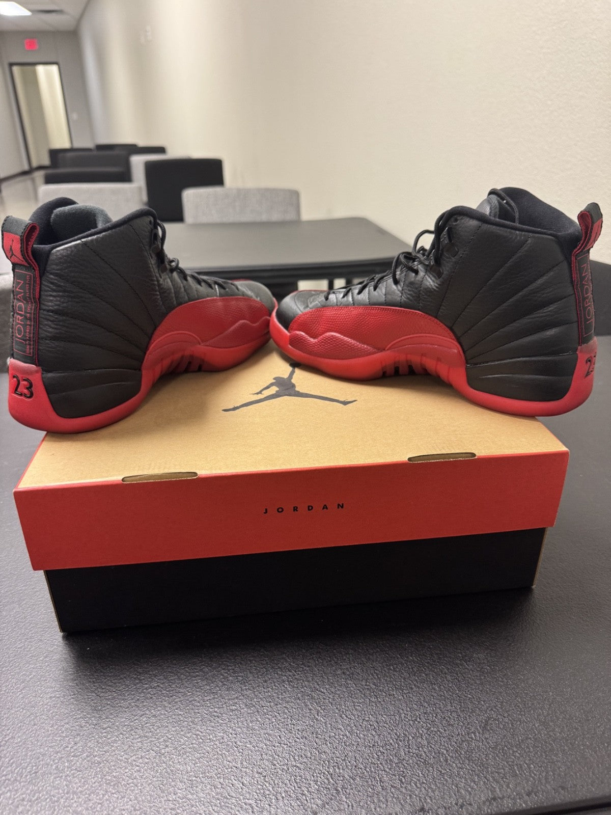 Air Jordan 12 Flu Game Black Red High Top Men's Basketball Sneakers - product image from the listing.