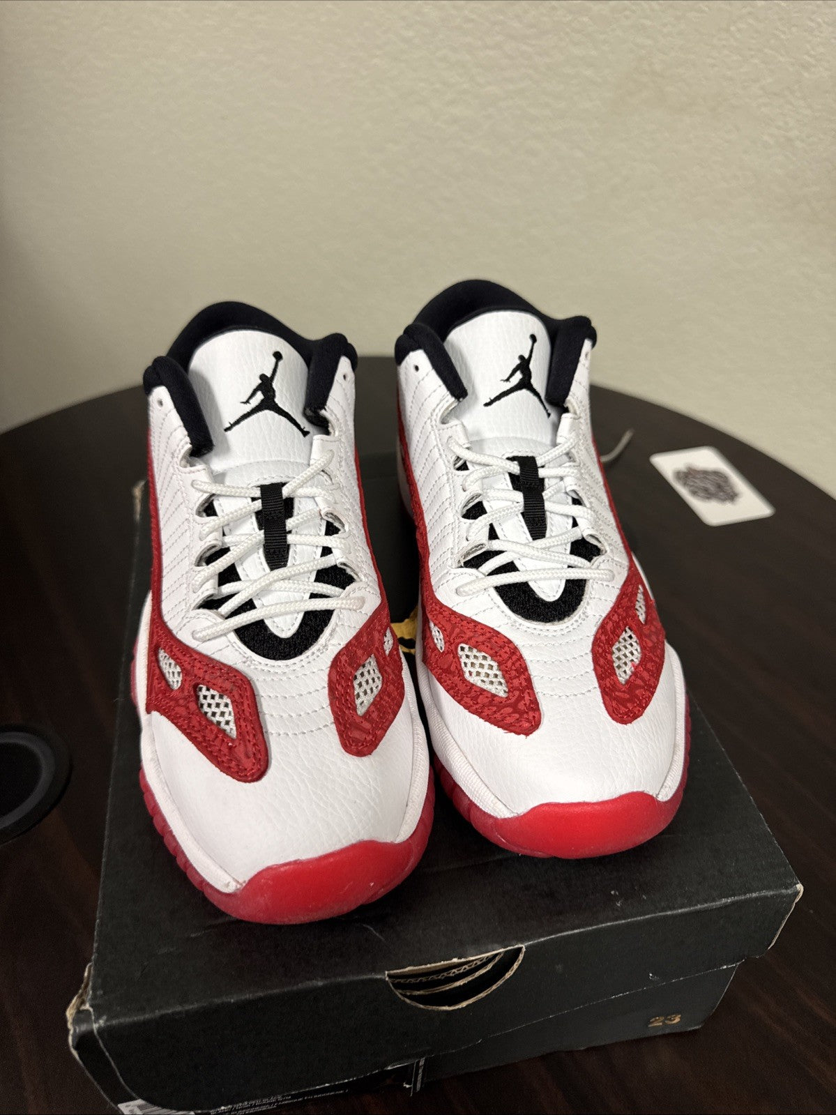 Air Jordan 11 Retro Low Boys White/gym Red Boys / Girls - Size 5Y - product image from the listing.
