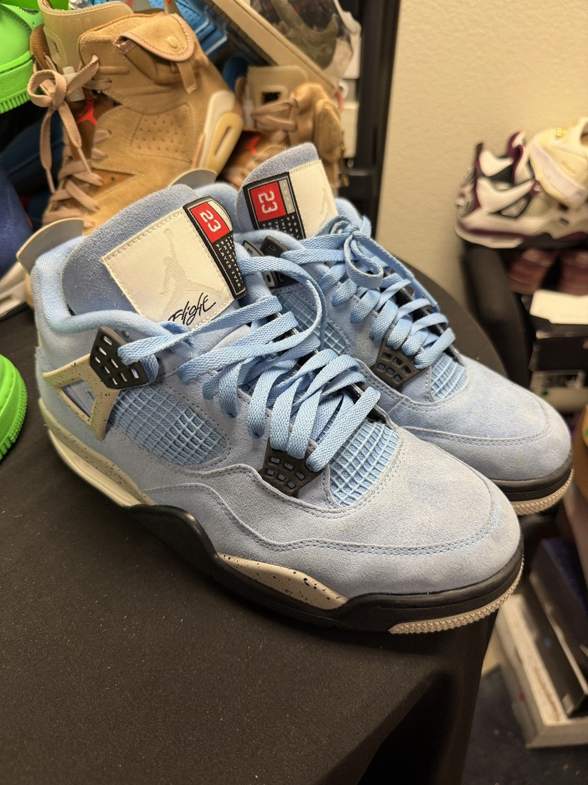 Jordan 4 Retro Mid University Blue - Size 11 - product image from the listing.