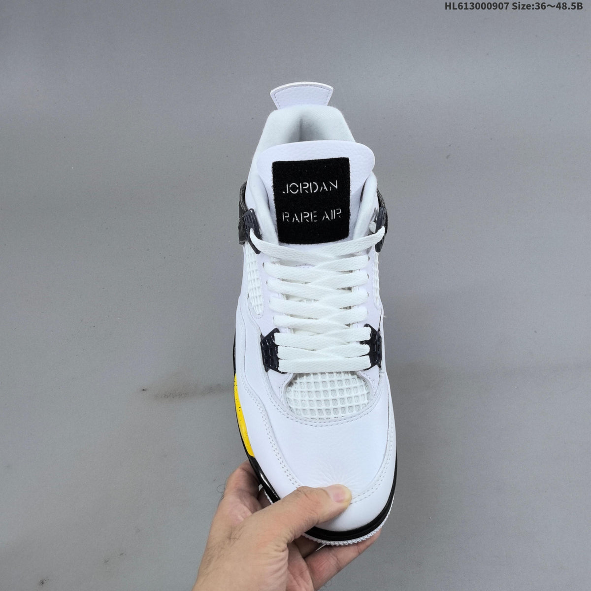 Air Jordan 4 Retro White Yellow Black Sneakers - product image from the listing.