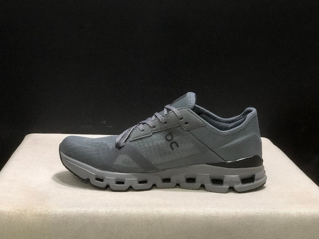 Gray and Black On Cloud X 4 AD Sneakers - product image from the listing.
