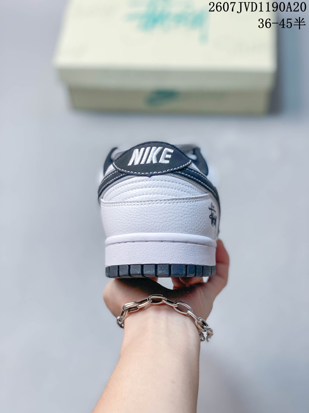 Nike SB Dunk Low Stüssy Sneakers in White Black - product image from the listing.