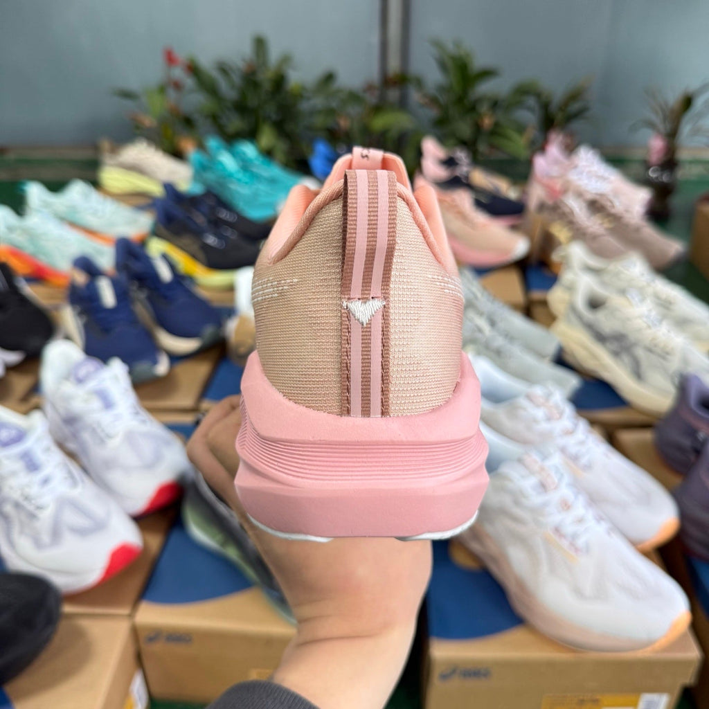 ASICS Novablast 5 LE Running Shoes in Pink - product image from the listing.