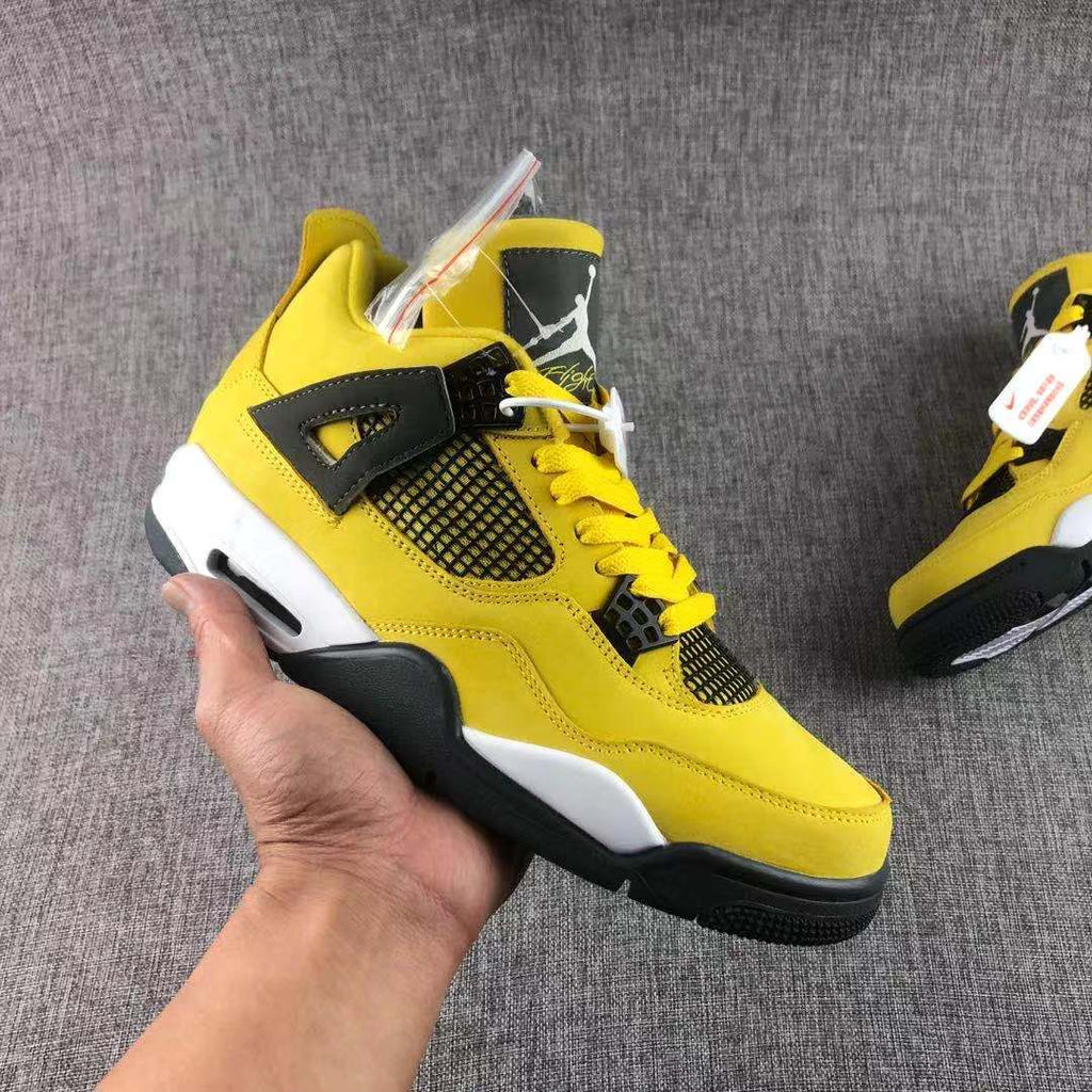 Air Jordan 4 Lightning Yellow Black Sneakers - product image from the listing.