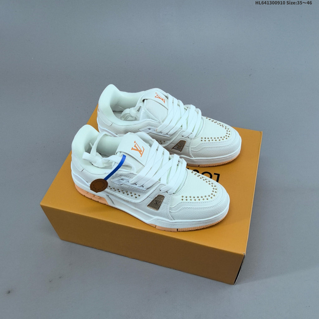 White and Black Louis Vuitton Studded Low-Top Sneakers - product image from the listing.