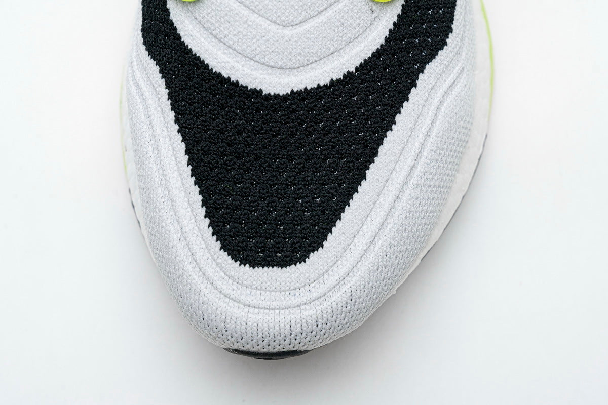 adidas UltraBoost 21 Running Shoes, in White and Volt FY1214 - product image from the listing.