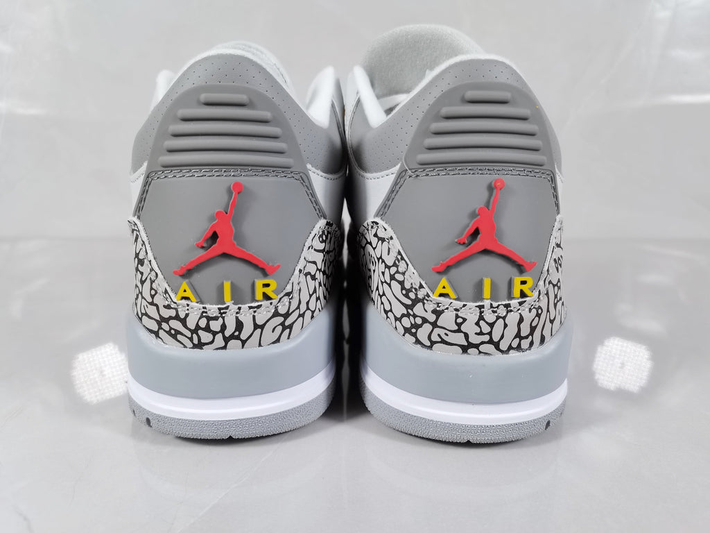 Air Jordan 3 Retro Grey and Orange Sneakers - product image from the listing.