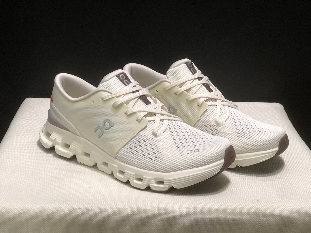 On Cloud X 4 Running Sneakers in Ivory - product image from the listing.