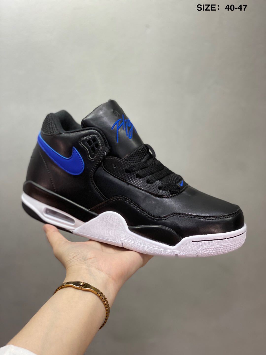 Nike Air Flight 89 Sneakers in Black and Royal Blue - product image from the listing.