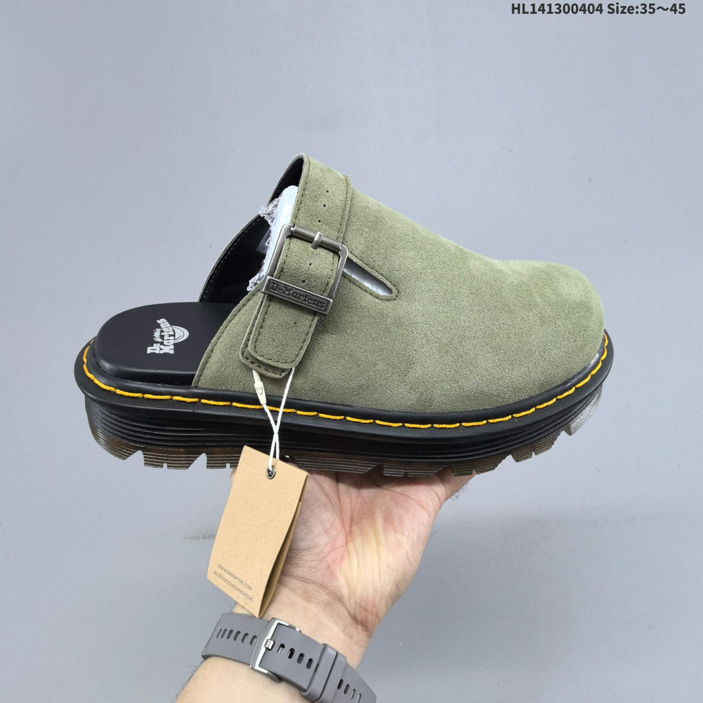 Buckle-Strap Mule Clogs in Black and Sage by Dr. Martens - product image from the listing.