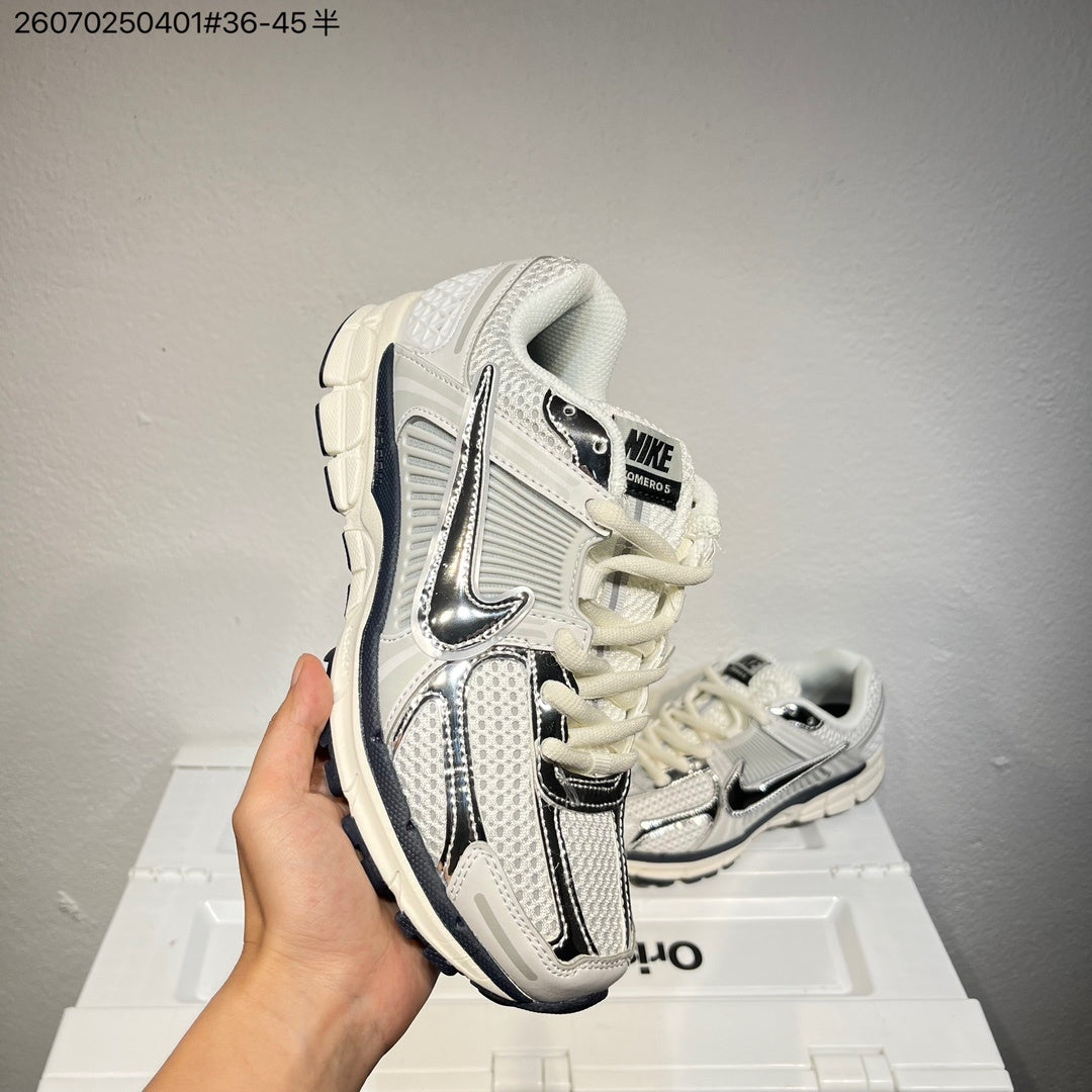 Nike Air Zoom Vomero 5 Sneakers, in White and Black - product image from the listing.