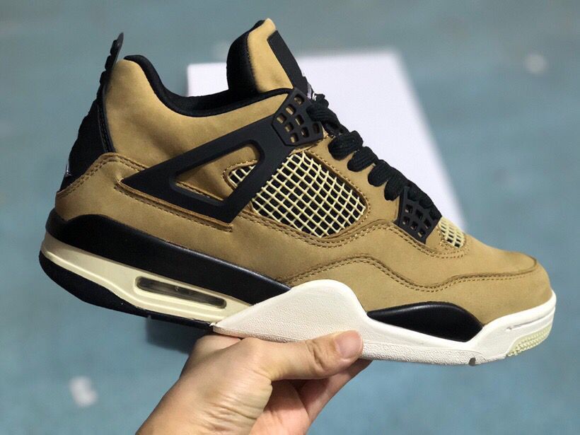 Jordan 4 Retro Sneakers in Tan Black - product image from the listing.