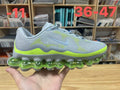 Gray and Volt Nike Air Liquid Max Running Shoes - product image from the listing.