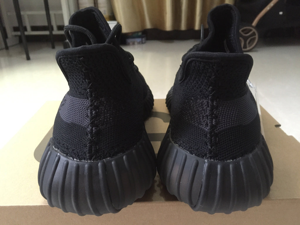 Adidas Yeezy Boost 350 V2 Sneakers in Black Knit - product image from the listing.